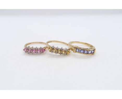 Three 9ct yellow gold (hallmarked) rings with coloured stones - ring sizes R/S, U/V &amp; Q - approx weight 6.9 grams 