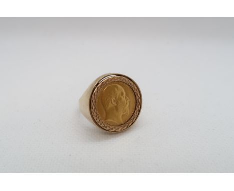 A 1908 half sovereign mounted as a ring in 9ct (hallmarked) yellow gold - approx weight 9.1 grams 