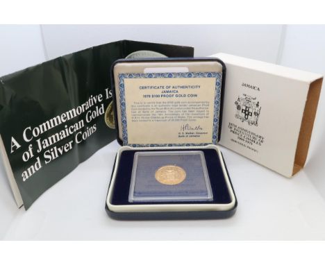 A Jamaica 1979 $100 gold proof coin commemorating 10th anniversary of The Institute of H.R.H Prince Charles as Prince of Wale