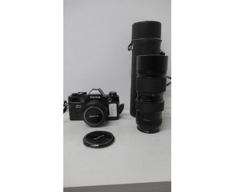 A Konica FP1 programme camera and two lenses, Konica AR50mm F1.8 and a Konica 80-200 zoom lens - excellent condition 