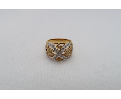 An 18ct gold (hallmarked) ring set with diamonds - ring size N - approx weight 8.1 grams 
