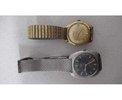 Two gents watches - Royce day/date automatic gold plated round case 35mm - working in the saleroom and a Rotary date steel ca