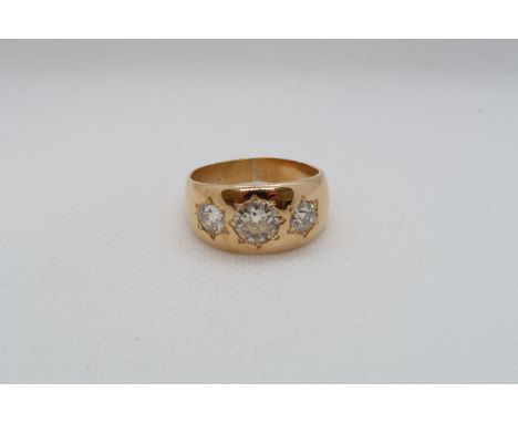 An impressive gents three stone diamond ring - The old cut diamonds total weight approx 2.4ct with central stone approx 1.25c