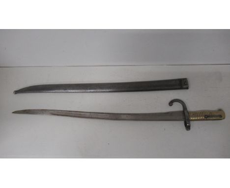 A 19th century French Chassepot 'Yataghan' Bayonet in matching steel scabbard - blade approx 56cm 