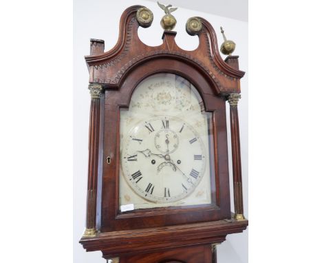 A good quality 8 day longcase clock with an arched convex dial with seconds hand and a calendar - the flame mahogany case wit