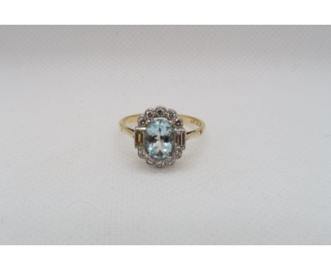 An 18ct yellow gold and platinum Art Deco style aquamarine and diamond ring - diamonds are bright and lively, head size appro