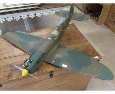 A flying Balsa wood scale model Spitfire  fighter plane, wingspan approx 108cm - length approx 94cm with Sanwa RD6000 Radio C