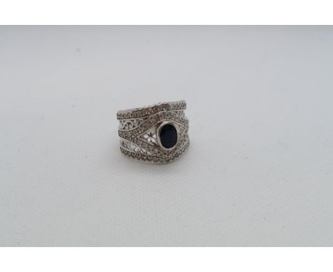 A 14ct white gold (hallmarked) ring with diamonds and spinel - ring size N - approx weight 6.7 grams 