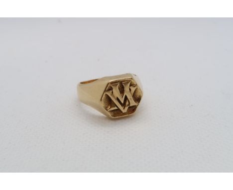A mans yellow gold (tested) signet ring - tested as approx 18ct - ring size P/Q - weight approx 14.5 grams 