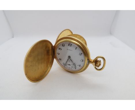 A gold plated Summit pocket watch - 4.5cm - working in the saleroom 