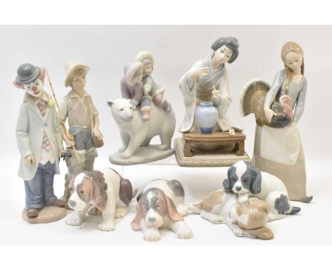 LLADRÓ; eight Spanish high-gloss figures comprising geisha girl, girl with turkey, height 24.5cm, boy fishing, clown with vio