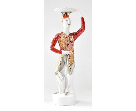 SILVIA KLÖDE FOR MEISSEN; a 20th century porcelain figure of a man in a red, gold and green costume, modelled as a pricket ca