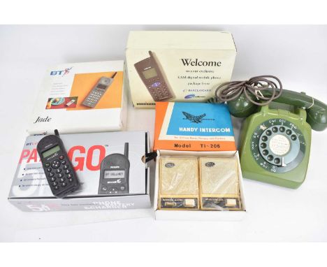 Various vintage telephones to include a Seven Series green dial telephone, a boxed Alcatel Cellnet mobile phone, a boxed hand