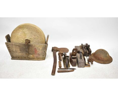 A vintage knife-sharpening wheel and a collection of vintage woodworking tools to include planes, axe, etc.Condition Report: 