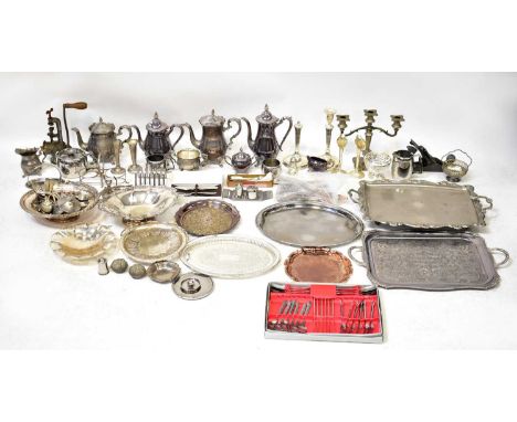 A quantity of silver plated items and metalware to include trays, tea pots, cutlery, bone-handled cutlery, swing-handled bask