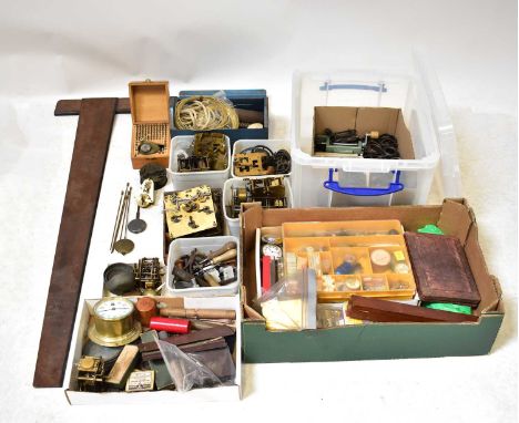 A sizable collection of pocket watches, watch and clock parts, and vintage tools to include WWII military watchmaker's drill 
