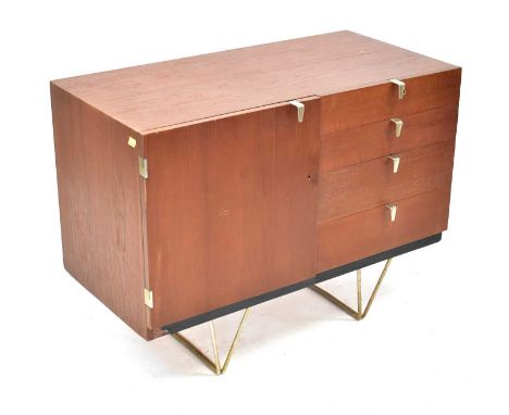 STAGG; a shelving unit by John and Sylvia Read, comprising four upper shelves on flat back above a four-drawer cabinet base, 