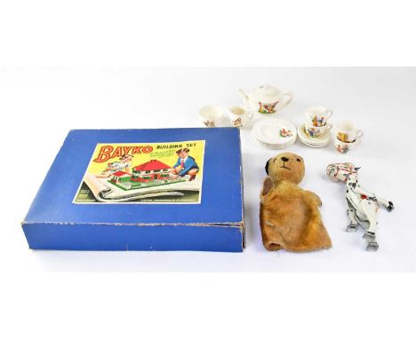 A Bayko 'Building Set no. 2', together with a 'Sooty' hand puppet, a 'Muffin the Mule' metal puppet and a children's tea set 