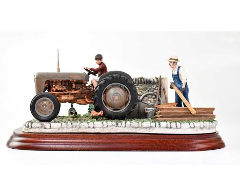 BORDER FINE ARTS; a model tractor, 'Golden Memories', model no. B0799, with wooden base, in original box and packaging.Condit