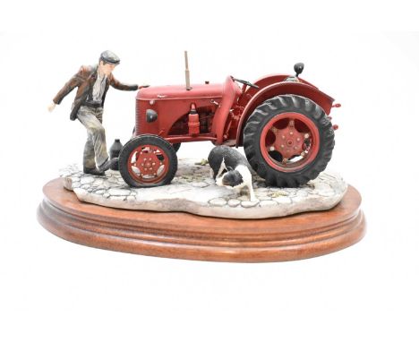 BORDER FINE ARTS; a model tractor, 'Kick Start', model no. B0541, with wooden base, in original box and packaging.Condition R