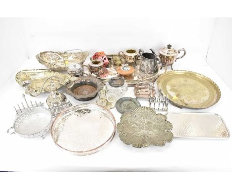 A mixed quantity of silver plated, chrome plated and stainless steel items including a tea set, dishes, bottle coaster, candl