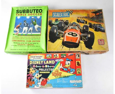 Six boxed games comprising Scalextric Set 31, Go, Mine a Million, Escalado, Subbuteo Table Soccer Continental Club Edition an