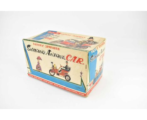 ROSKO TOY (JAPAN); a boxed 'Battery-Operated Shaking Antique Car', model 0118.Condition Report: Looks in good condition, has 