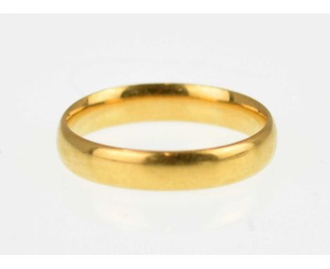 A 22ct gold wedding band, size K, approx. 3.3g.
