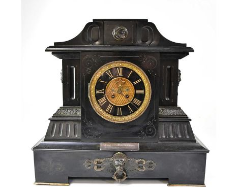 SAMUEL MARTI ET CIE; a very large Victorian black slate mantel clock of architectural form, the chapter ring with engraved Ro