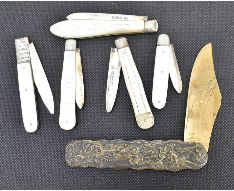 Five hallmarked silver bladed fruit knives with mother-of-pearl handles, the longest example in the form of a fish, length 8c
