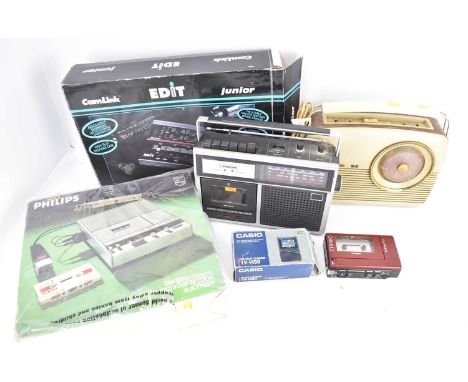 A collectors' lot to include a Bush radio, a Sanyo stereo Walkman, a boxed Casio LCD colour television TV-1450, a Fergusson t