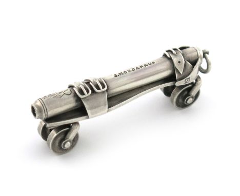 A Victorian novelty silver pencil, by S. Mordan and Co., with a registration lozenge for 1879, modelled as a roller-skate, wi