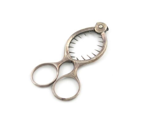 An Edwardian silver egg cutter, by William Hutton and Sons Ltd., Sheffield 1907, scissor form, length 10cm, approx. weight 1.