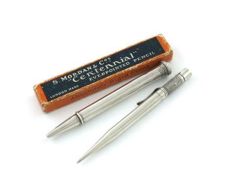 A Mordan Centenary silver pencil, London 1915, also marked patent, the finial with a pencil reserve, length 11cm, plus a  Mor