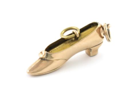 A novelty gold pencil, by S. Mordan, also marked Rd199100, modelled as a shoe, with two ring attachments, length closed 4.1cm