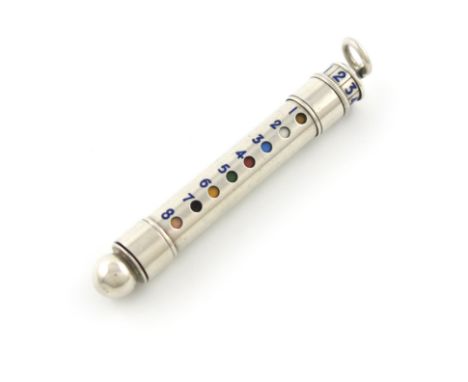 A novelty silver and enamel pencil, by S. Mordan and Co, also marked 'Pan Tan patent, sterling silver', cylindrical form, the