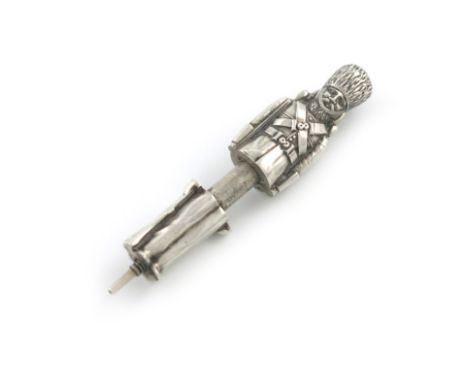 A Victorian novelty figural silver pencil, by S. Mordan and Co. modelled as a Guardsman, with a ring attachment, length 5.5cm