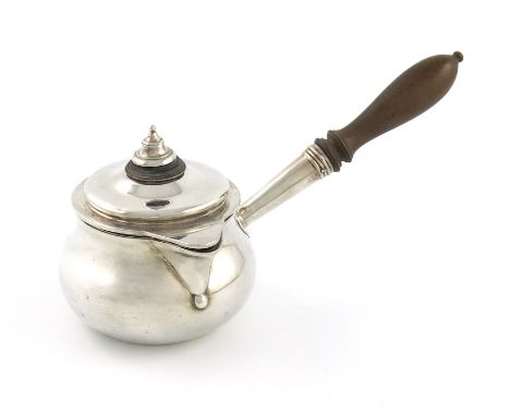 An early Victorian silver brandy pan and cover, by The Barnards, London 1838, circular baluster form, turned wooden baluster 