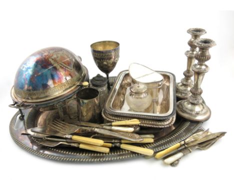 λA large quantity of electroplated items, comprising: an oval two-handled tray, a pair of candlesticks, various entrée dishes