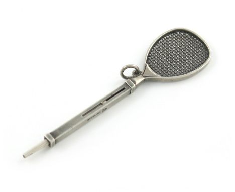 An American  novelty silver pencil, marked with a cipher and Sterling, modelled as a tennis racquet, with a ring attachment, 