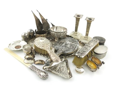 λA mixed lot of silver and metalware, comprising: an Edwardian dressing table tray, Chester 1902, embossed with cherub heads,