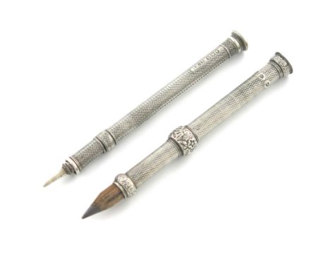 A George IV silver port-crayon, by Robert Mosely, Birmingham 1822, engine-turned decoration, hobnail terminal, length 10.5cm,