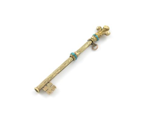 A Victorian novelty gold pencil, unmarked, modelled as a key, set with turquoise stones and with a Prince of Wales feather fi