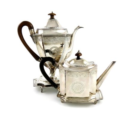 A George III silver coffee pot on stand with a similar George III  teapot on stand, the coffee pot by Peter and Ann Bateman, 