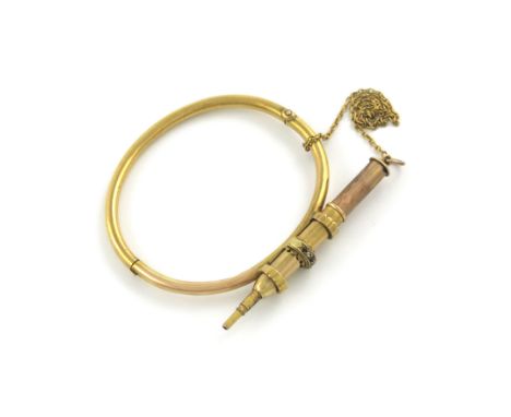 A Victorian gold bracelet sheath pencil, unmarked, the mount set with precious stones, with a chain attachment, length 6.3cm.