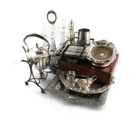 A large quantity of electroplated items, comprising: a three-bottle decanter frame, with a central handle and with three cut 