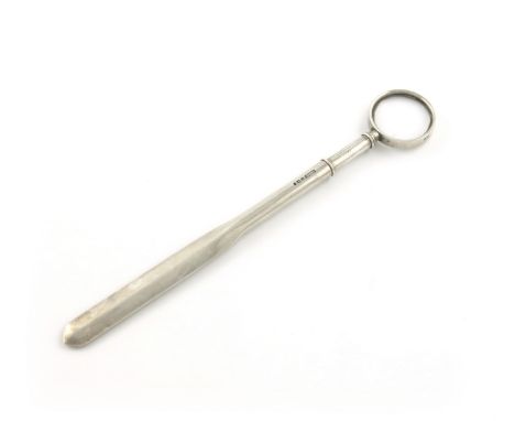 A silver combination pencil, magnifying glass and paper knife, by S. Mordan and Co., London 1927, the paper knife pulls off t