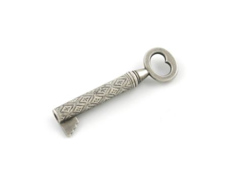 A Victorian novelty silver pencil, unmarked, modelled as a key, engraved decoration, inscribed 'To Clarence from Jessie', len