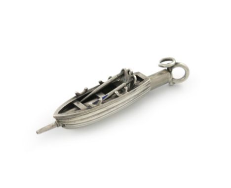 A Victorian novelty silver pencil, unmarked, modelled as a rowing boat, with  blue enamelled oars, a rudder formed as a ring 