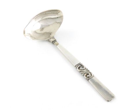 By Johan Rohde, Georg Jensen, a Danish silver Scroll pattern cream ladle, design no.22, spot-hammered oval bowl, length 14cm,